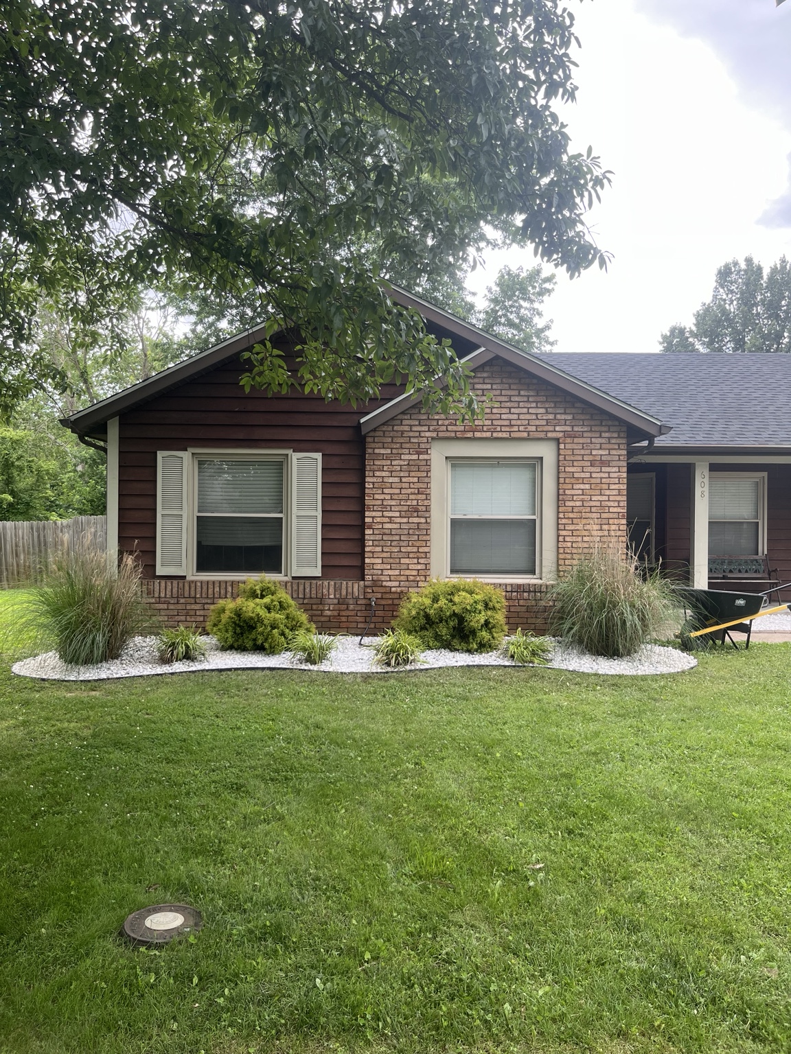 McGee's landscaping project with white rock, shrubs and ornamental grasses